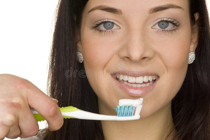 Beautiful woman is doing oral hygiene. Beautiful woman is doing oral hygiene