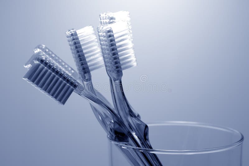 Photo of Various Toothbrushes in a Glass - Oral Hygiene. Photo of Various Toothbrushes in a Glass - Oral Hygiene