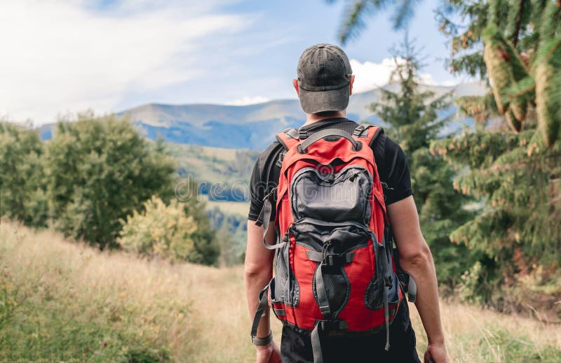 Hiker with Backpack Looking on Mountain Stock Photo - Image of alone ...