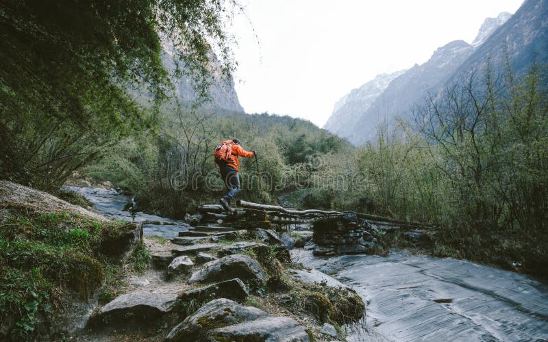 Hiker crossing the bridge