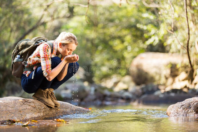 Hiker drinking water royalty free stock photo Hiker drinking water royalty free stock photo