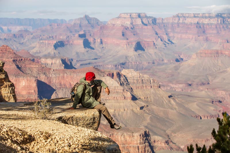 A hiker in the Grand Canyon National Park, South Rim, Arizona, USA stock photo A hiker in the Grand Canyon National Park, South Rim, Arizona, USA stock photo