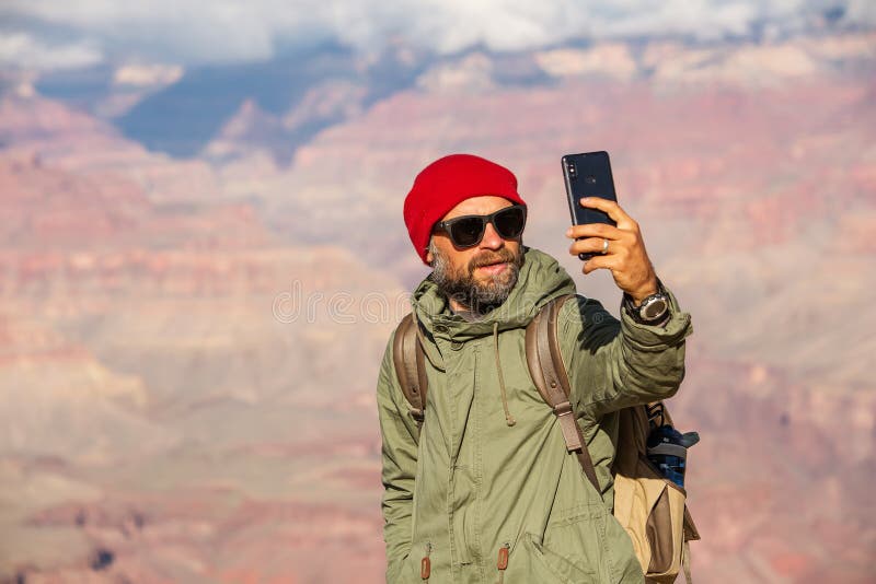 A hiker in the Grand Canyon National Park, South Rim, Arizona, USA stock photo A hiker in the Grand Canyon National Park, South Rim, Arizona, USA stock photo