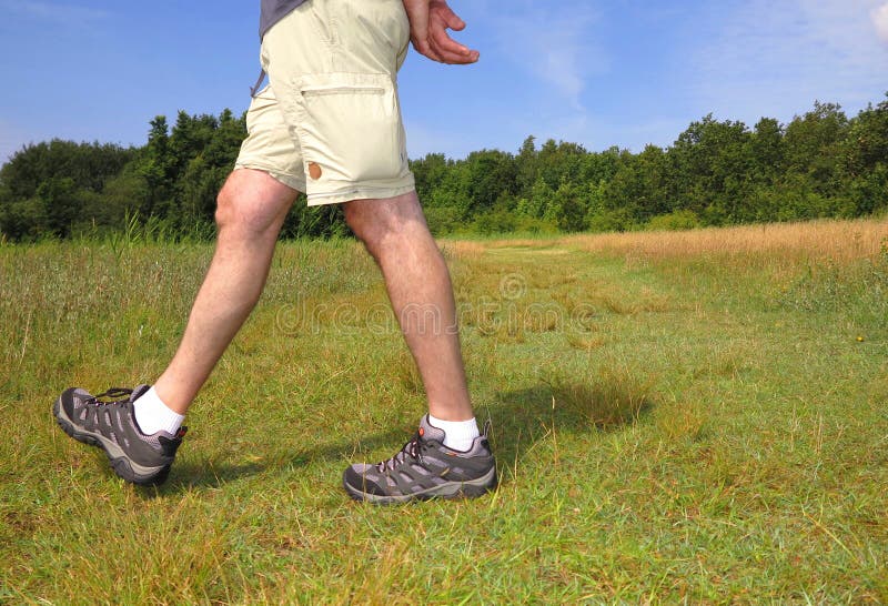 Hiker on grass stock image. Image of hiking, road, nordic 45602105