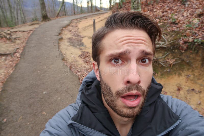 A hiker makes a surprised face at camera royalty free stock photography A hiker makes a surprised face at camera royalty free stock photography
