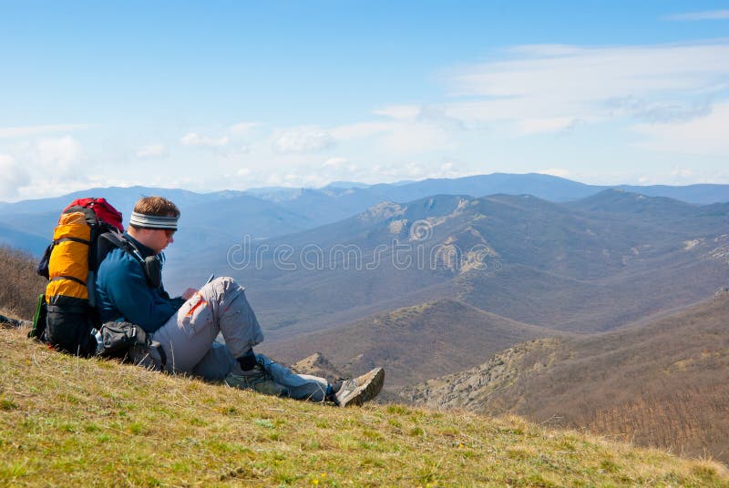 Hiker using mobile device