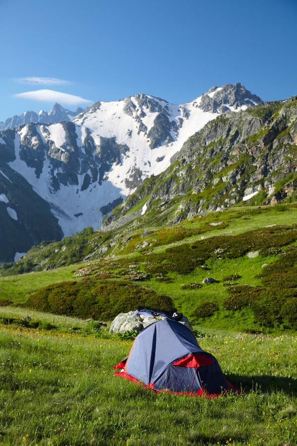 Hikers tent in mountans