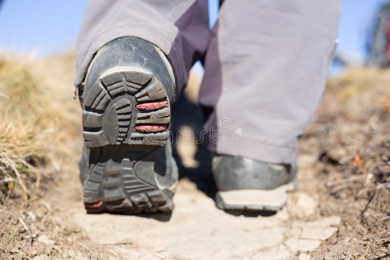 Hiking Boot Closeup on Mountain Rocks. Stock Photo Image of sports