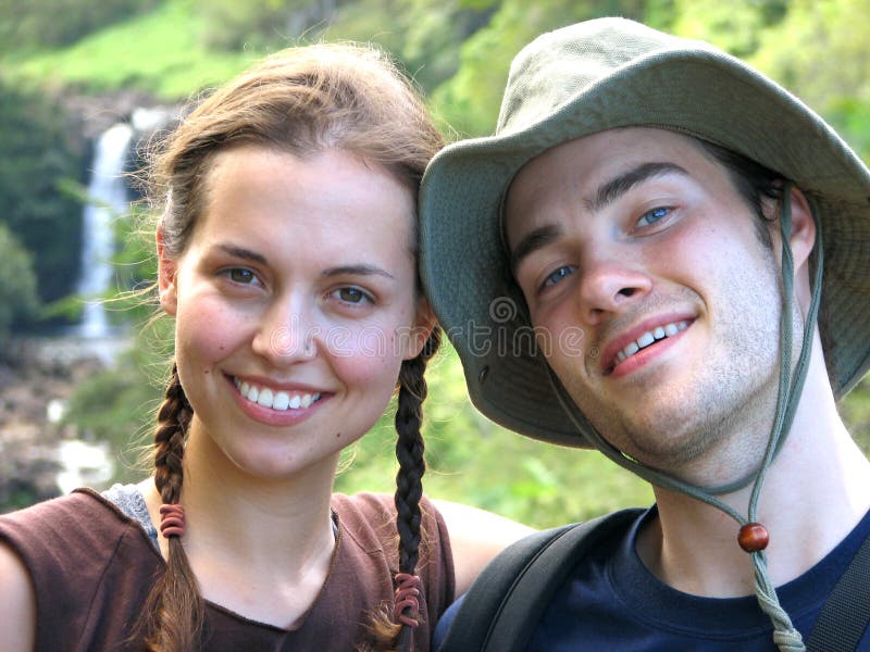 Hiking Couple with Waterfall