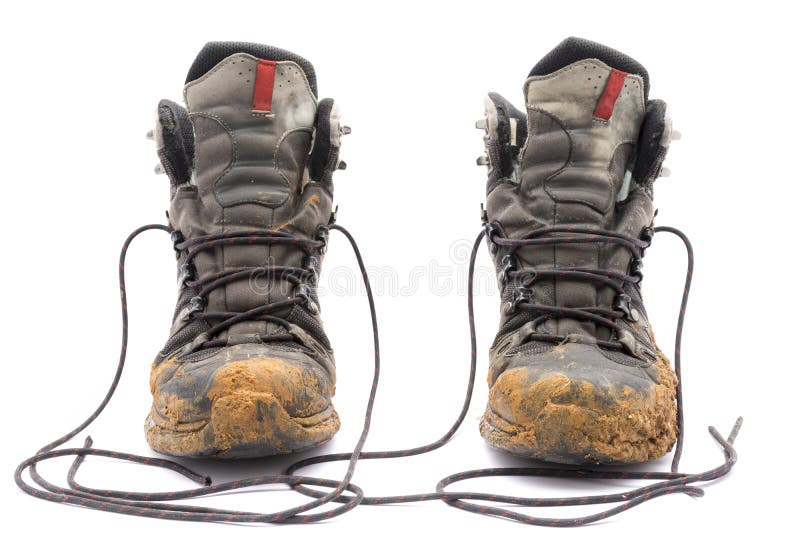 Hiking dirty boots on white background royalty free stock images Hiking dirty boots on white background royalty free stock images