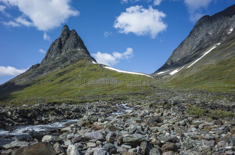 Hiking in picturesque Swedish Lapland landscape. Nallo mountain in northern Sweden. Arctic environment of Scandinavia