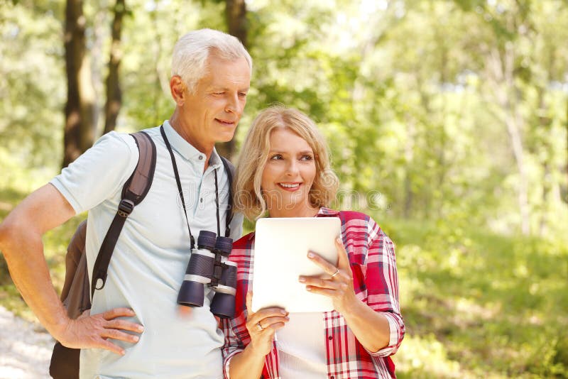 Hiking senior couple stock image. Image of excursions - 57106781