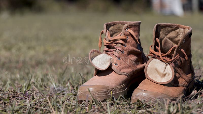 Hiking Shoes on the Hay Grass Stock Photo - Image of person, nature ...
