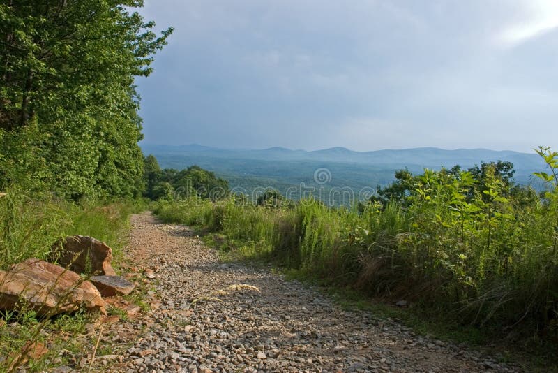 Hiking trail from Amicalola Falls. Chattahoochee National Forest, Georgia. Storm clouds in background.