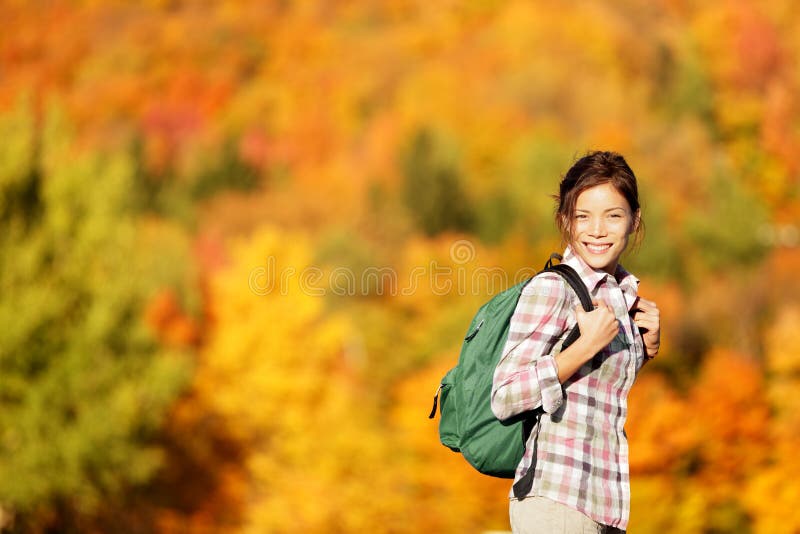 Hiking woman in Fall forest