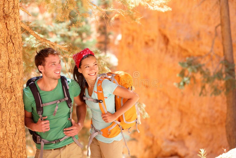 Hiking - young couple of hikers royalty free stock images Hiking - young couple of hikers royalty free stock images