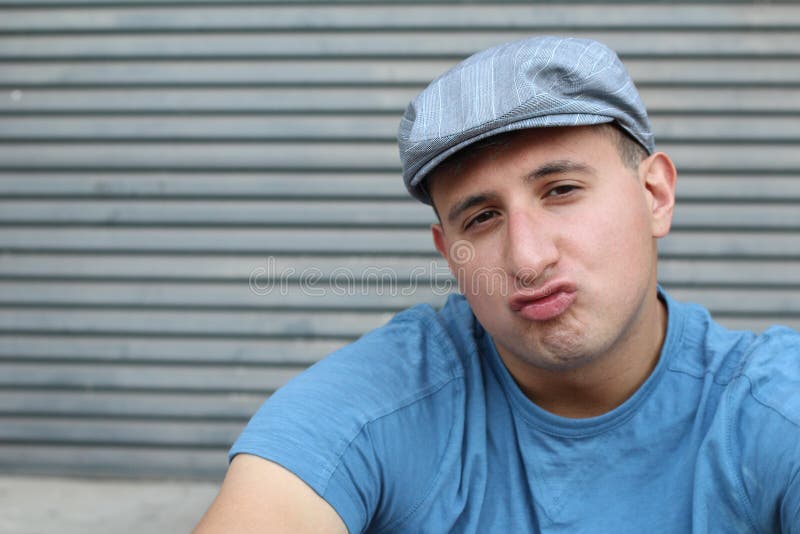 Hilarious young guy with pursed lips or duck lips expression. stock photography Hilarious young guy with pursed lips or duck lips expression. stock photography