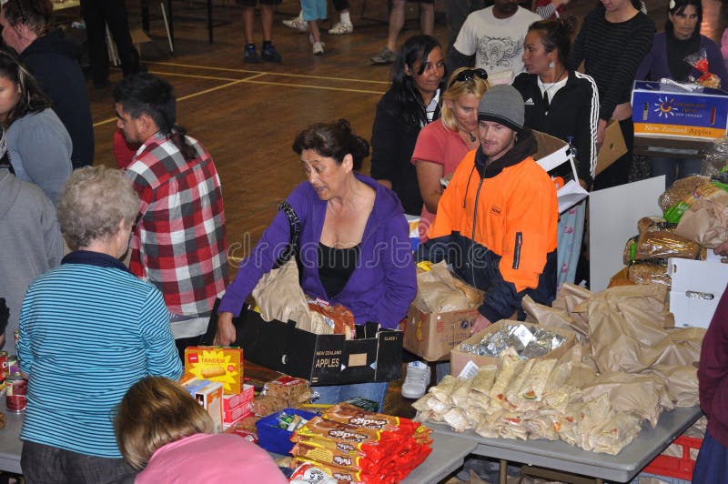 Victims of the 6.4 earthquake in Christchurch, South Island, New Zealand, 22-2-2011, queue for food supplies at a relief station in New Brighton. Victims of the 6.4 earthquake in Christchurch, South Island, New Zealand, 22-2-2011, queue for food supplies at a relief station in New Brighton