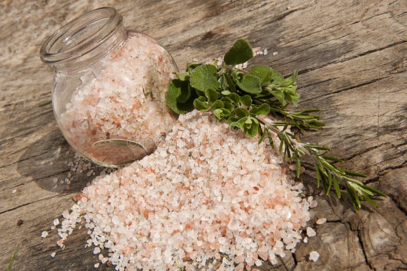 Himalayan salt on a wooden board royalty free stock images Himalayan salt on a wooden board royalty free stock images