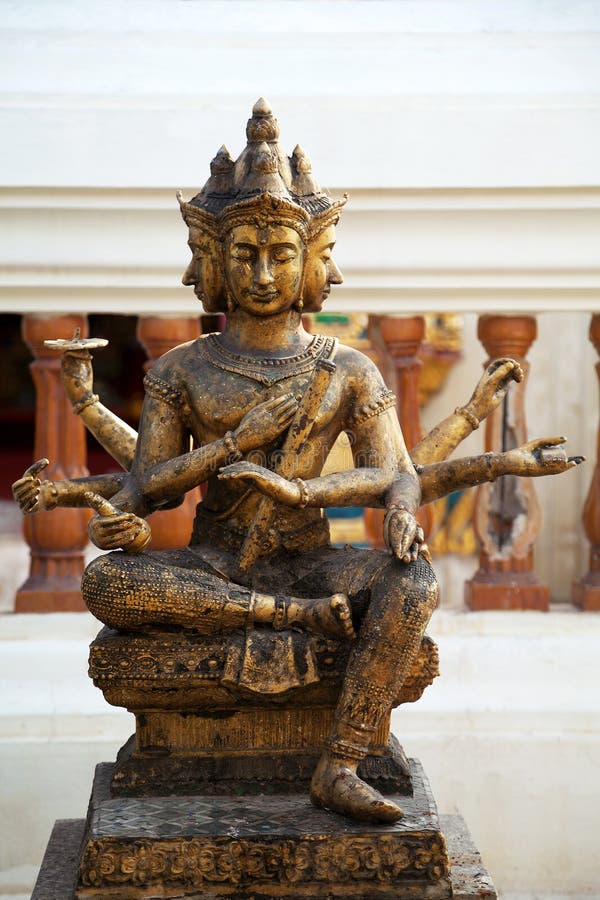 Hindu god Brahma gold shabby old statue in Thailand. Beautiful Indian religion traditional lord sculpture stock images