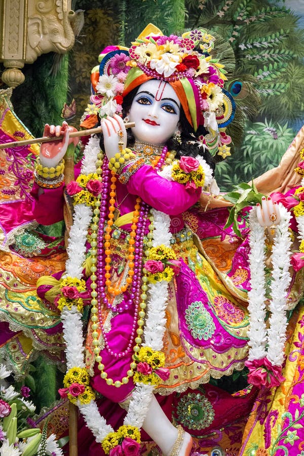 Hindu god Krishna. Bright colorful sculptural composition. stock photo