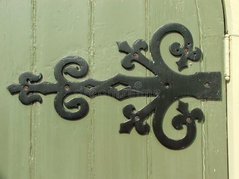 Ornate false decorative church door hinge