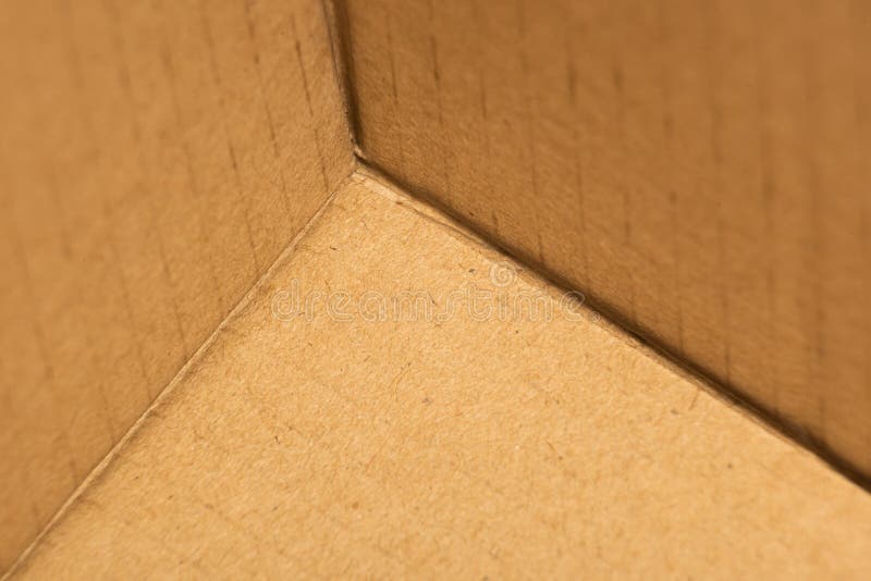 Hintergrund mit leerer Kartonecke stockbilder