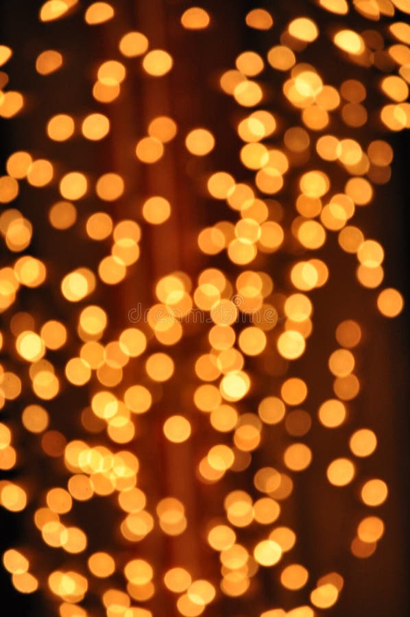 Hintergründe mit goldenen Lichtern stockfotografie Hintergründe mit goldenen Lichtern stockfotografie