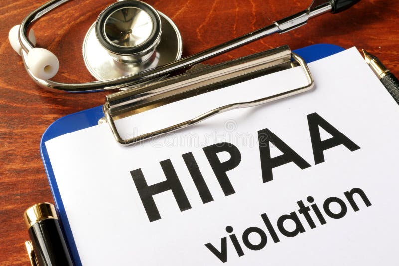 HIPAA violation form on a clipboard.