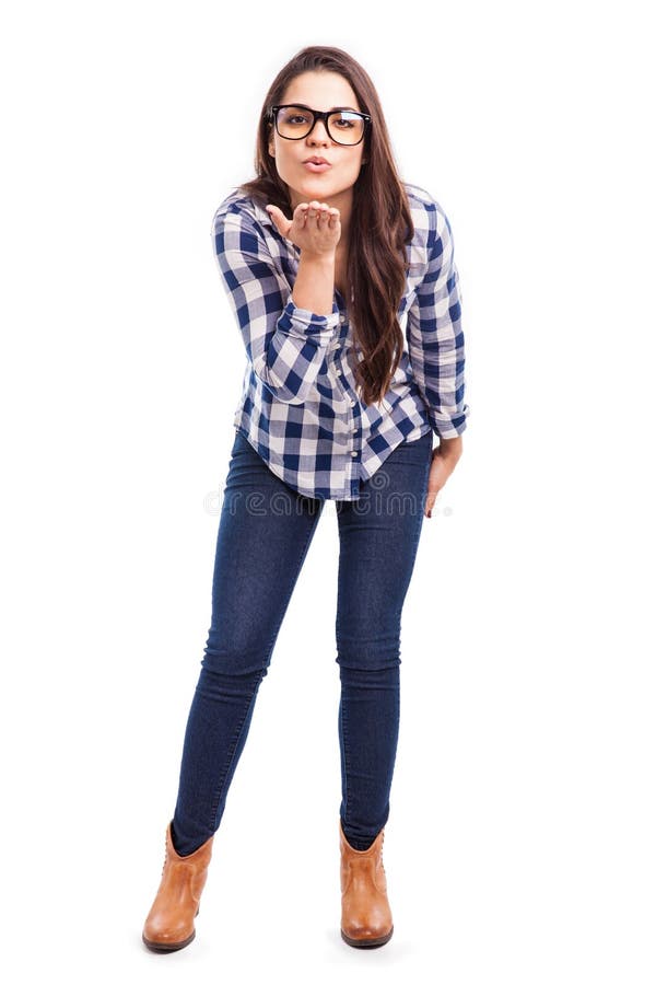 Hipster girl blowing a kiss stock photo Hipster girl blowing a kiss stock photo