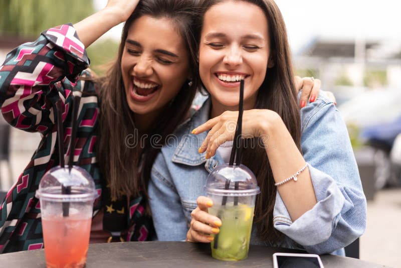 Hipster Girlfriends Drink Cocktail in Urban City Background Stock Image ...