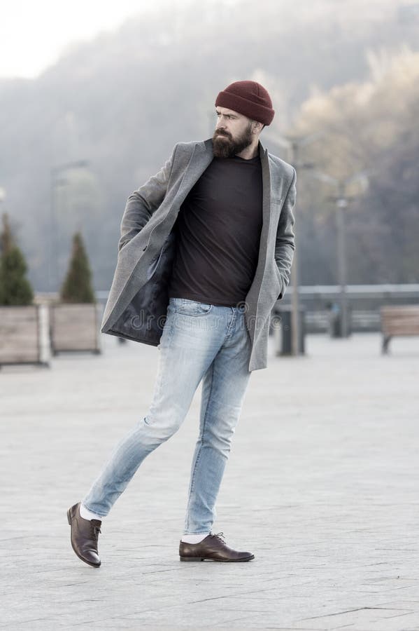 Hipster outfit and hat accessory. Stylish casual outfit spring season.  Menswear and male fashion concept. Man bearded hipster stylish fashionable  coat and hat. Comfortable outfit. Lumbersexual style - Stock Image -  Everypixel