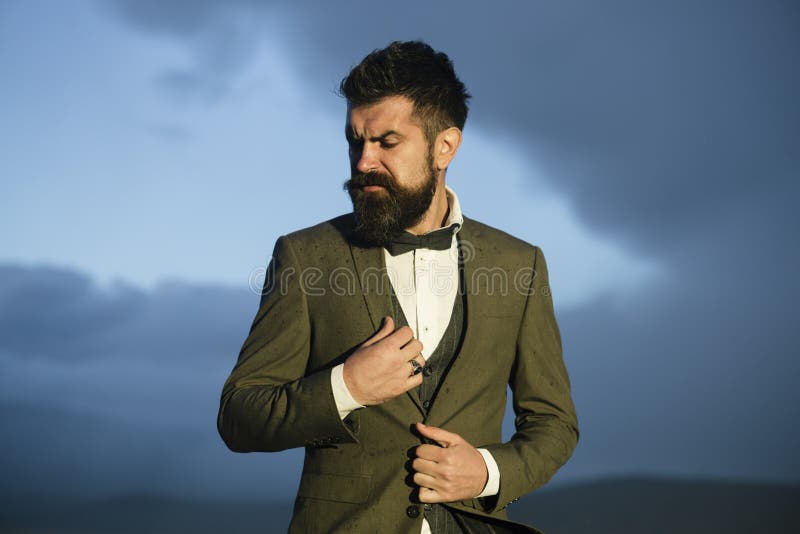 Hipster with stylish appearance in front of dramatic sky, skyline. stock photography Hipster with stylish appearance in front of dramatic sky, skyline. stock photography