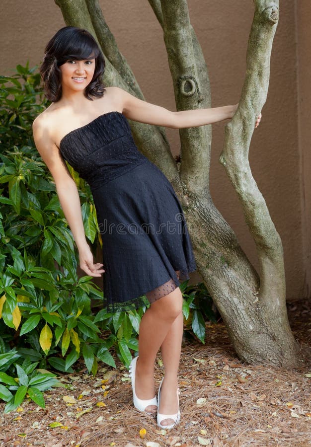 Hispanic/Asian Teen in Dress Outside