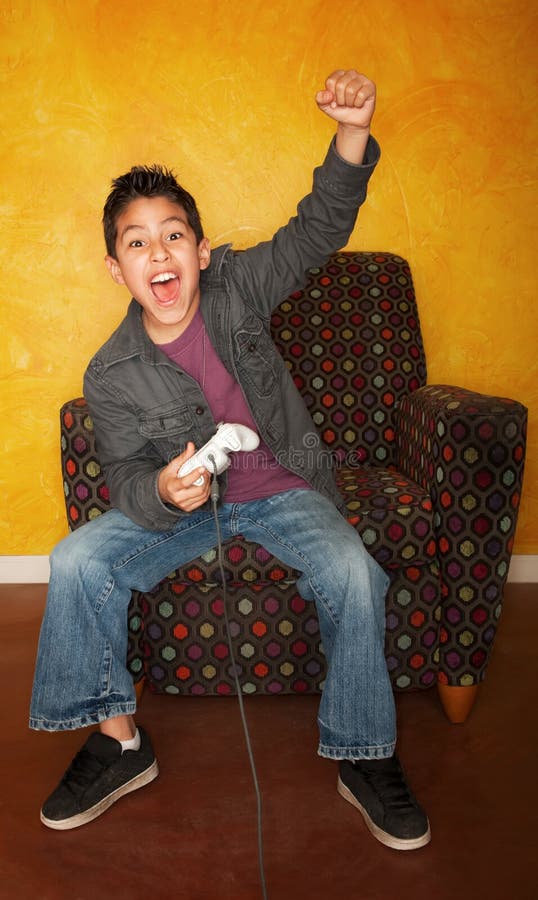 Hispanic Boy Playing Video Game