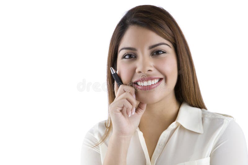 Hispanic business woman holding pen