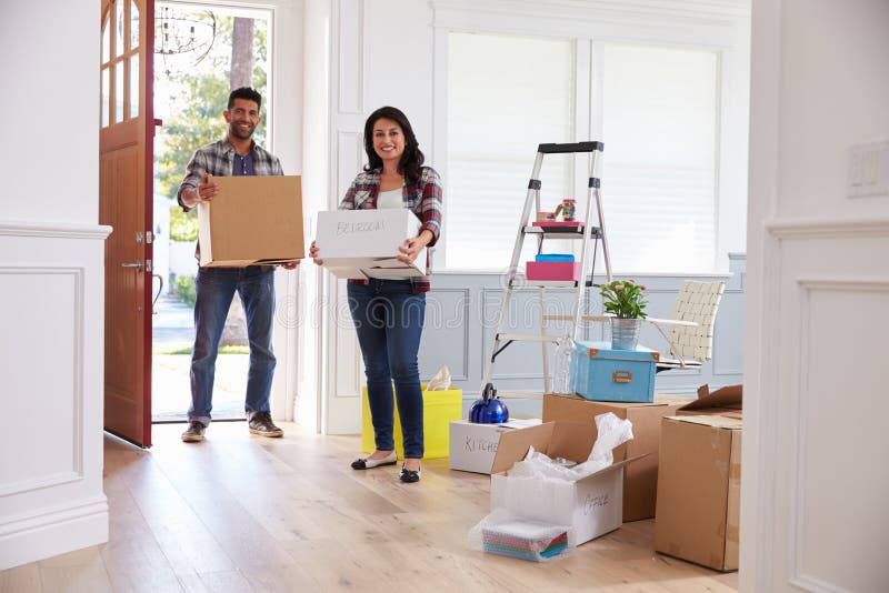 Hispanic Couple Moving Into New Home Together