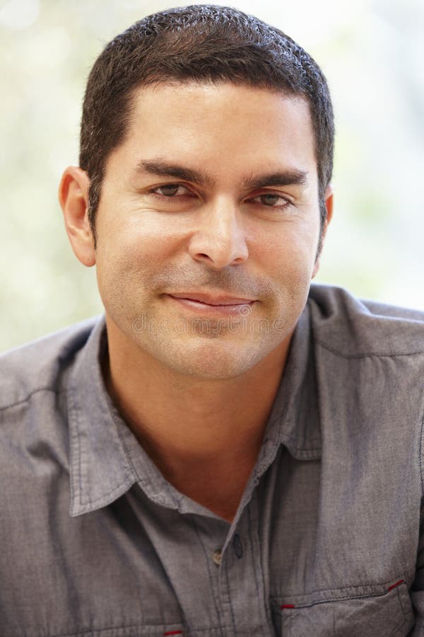 Hispanic man portrait stock image. Image of indoors, handsome - 55893061