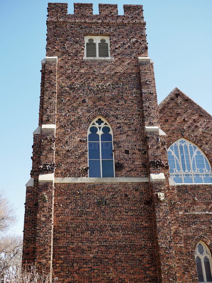 Anglican Church With Clinker Bricks In Edmonton Alberta. Historic Anglican Church with clinker brick against a blue sky in Edmonton Alberta royalty free stock photography Anglican Church With Clinker Bricks In Edmonton Alberta. Historic Anglican Church with clinker brick against a blue sky in Edmonton Alberta royalty free stock photography