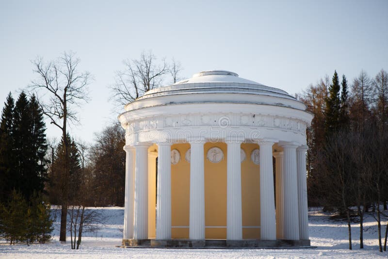 Pavilion Temple of friendship in Pavlovsk Park in winter in Saint Petersburg - symbols of friendship in ancient mythology. The historic architecture of architect Charles Cameron.