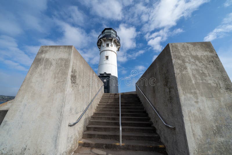 Historic Canal Park Lighthouse Against a Partly Cloudy Sky in Duluth