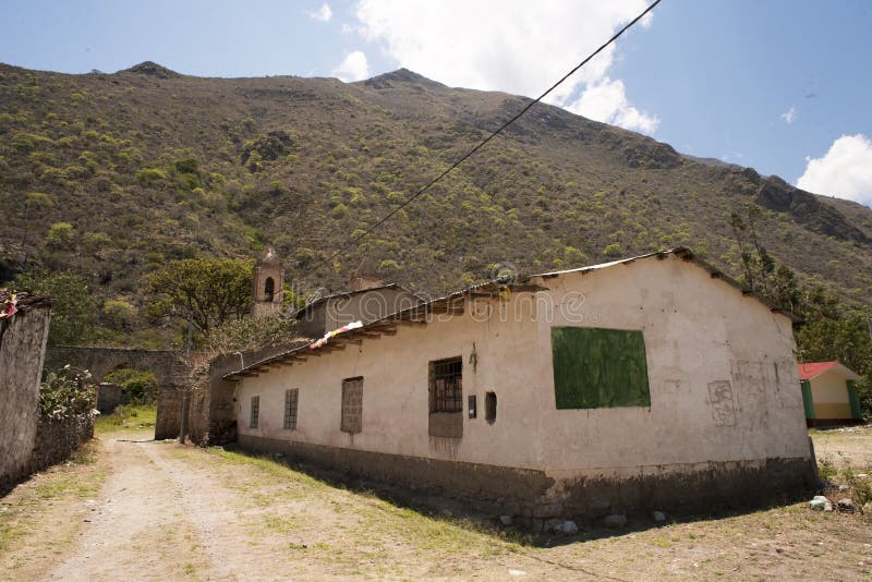 Casa Hacienda de Yaca from the abandoned and dilapidated sugar industry arc and door dirth road 20th century adobe