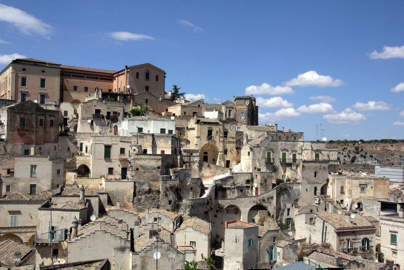 The historic center of the city of Matera, which is included in the UNESCO World Heritage List. Matera, Italy - 07/16/2017: The historic center of the city of stock photography The historic center of the city of Matera, which is included in the UNESCO World Heritage List. Matera, Italy - 07/16/2017: The historic center of the city of stock photography