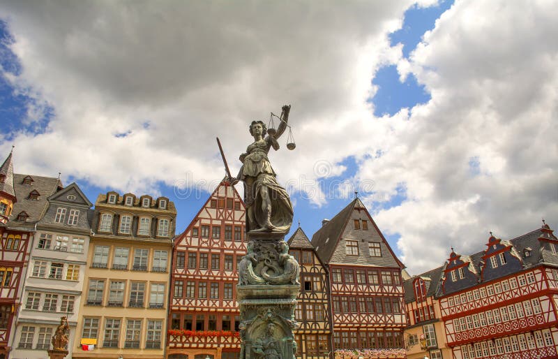 Historic city center of Frankfurt and statue of Justitia holding sword and scales royalty free stock image Historic city center of Frankfurt and statue of Justitia holding sword and scales royalty free stock image