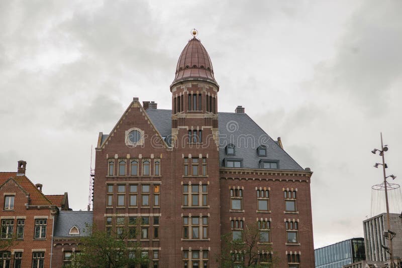 Historic multistory building with tower in Amsterdam, Netherland royalty free stock photography Historic multistory building with tower in Amsterdam, Netherland royalty free stock photography