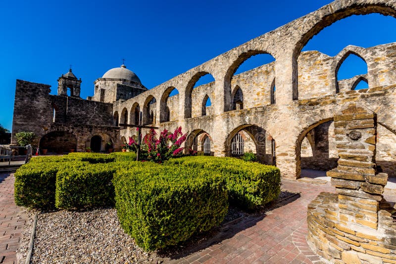 The Historic Old West Spanish Mission San Jose, Founded in 1720, San Antonio, Texas, USA. Showing dome, bell tower, and cross in