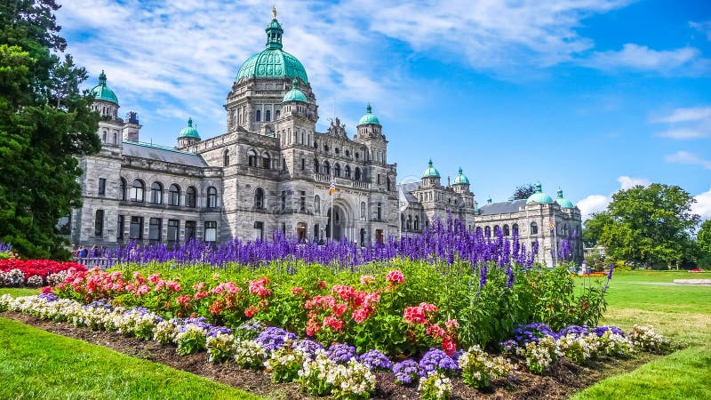 Historic parliament building in Victoria with colorful flowers, Vancouver Island, British Columbia, Canada