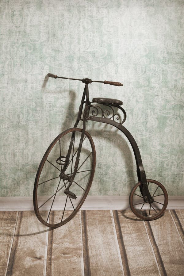 Historical bicycle by the wall