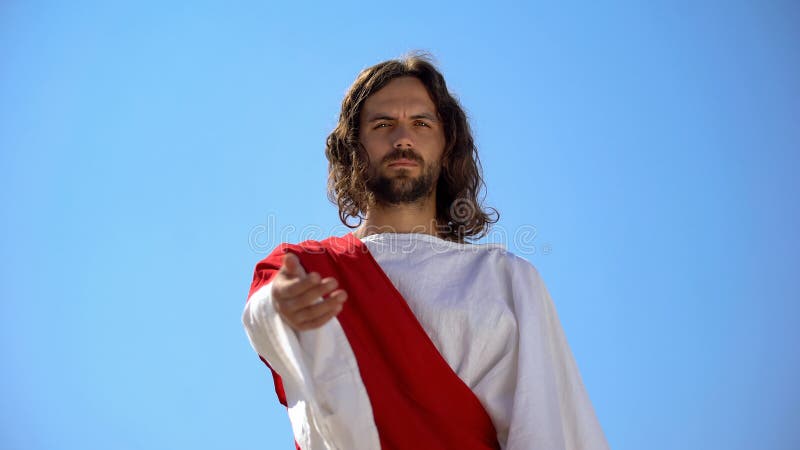 Historical personification of Jesus Christ reaching arm to camera, helping hand royalty free stock image Historical personification of Jesus Christ reaching arm to camera, helping hand royalty free stock image