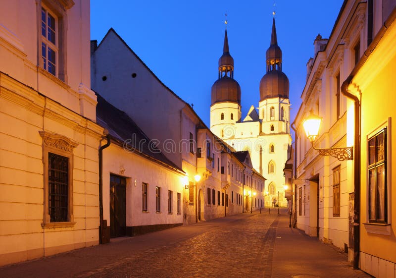 Historical street in Trnava with Saint Nicolas chu